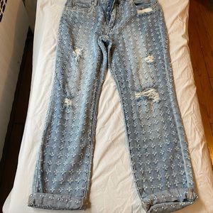 Size 28 distressed crop jeans.